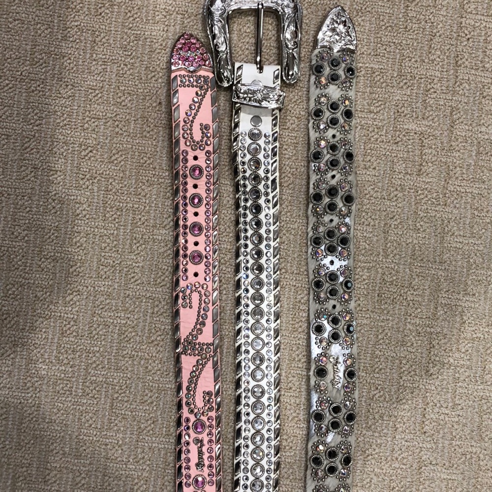 3 belts , gray pink and white